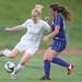 Skyline's Allie Moening kids the ball during the second half of the district finals against Pioneer, Friday May 31.
Courtney Sacco I AnnArbor.com